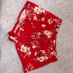 Red floral shorts with white flowers